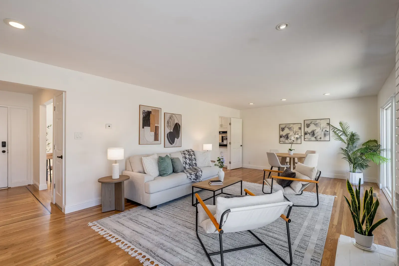 Staged living room with hardwood floors at 2990 Medina Drive, a San Bruno home sold by Nestor Icaza